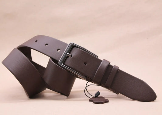 Close-up of a brown leather belt showing a smooth, evenly finished edge